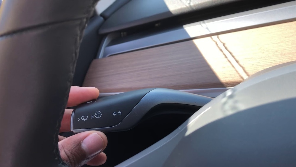 how to spray water on windshield tesla model jpg